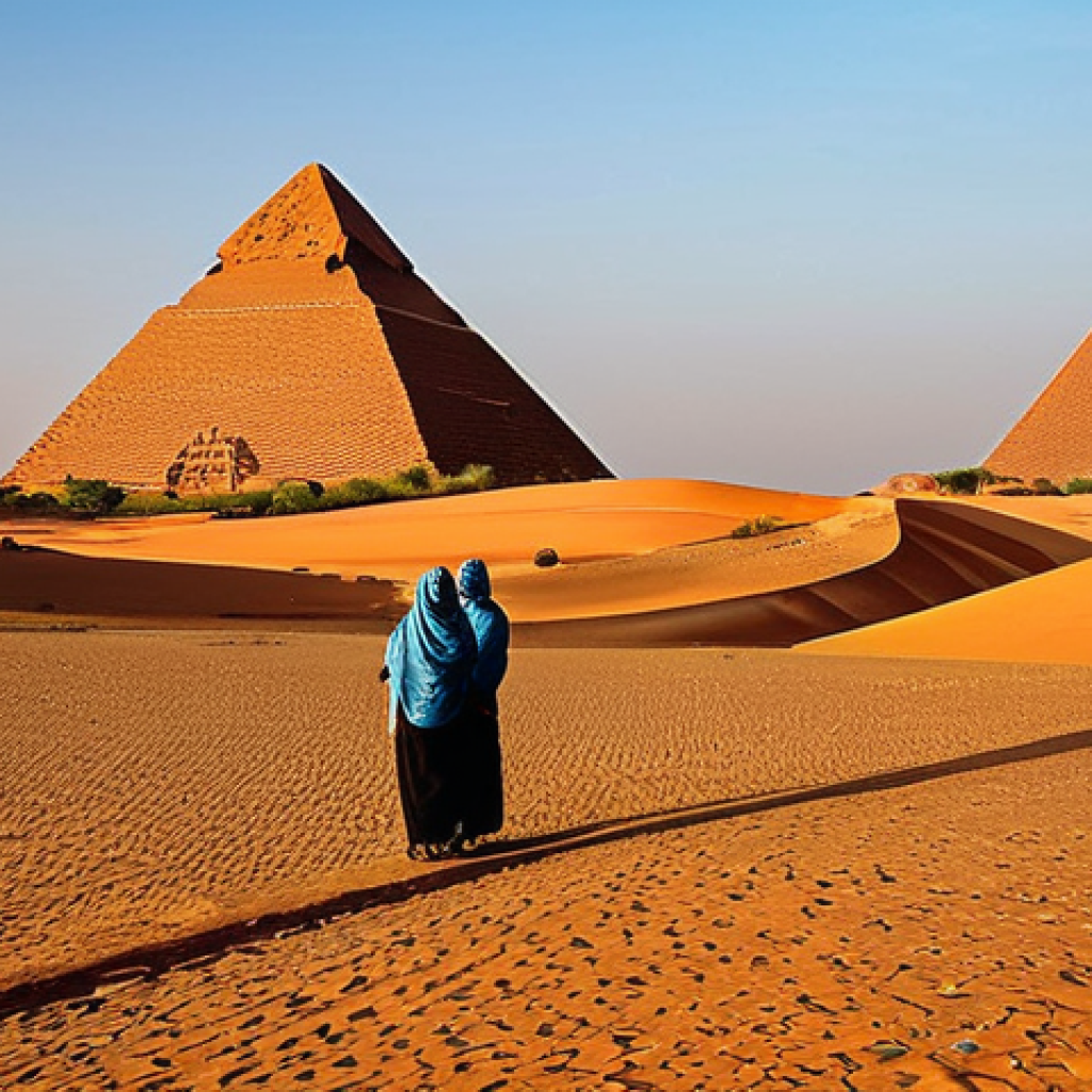 Meroe Pyramids at Sunset**

"A wide shot of the Meroe pyramids in Sudan at sunset, golden light illuminating the sand dunes. The pyramids are ancient and weathered, showcasing their unique Nubian design. In the background, a clear blue sky transitions to orange and red hues on the horizon. People in modest clothing are observing the pyramids. Safe for work, appropriate content, fully clothed, professional photography, perfect anatomy, natural proportions, family-friendly."

**